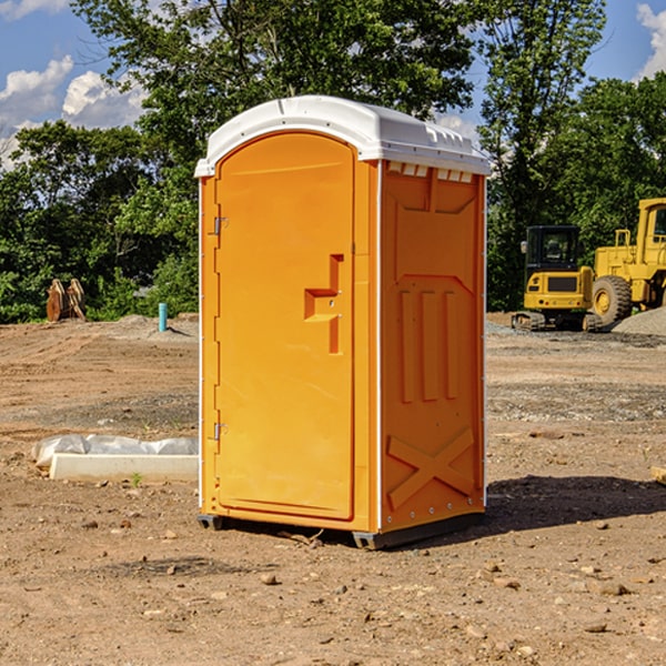 how often are the porta potties cleaned and serviced during a rental period in Hartman